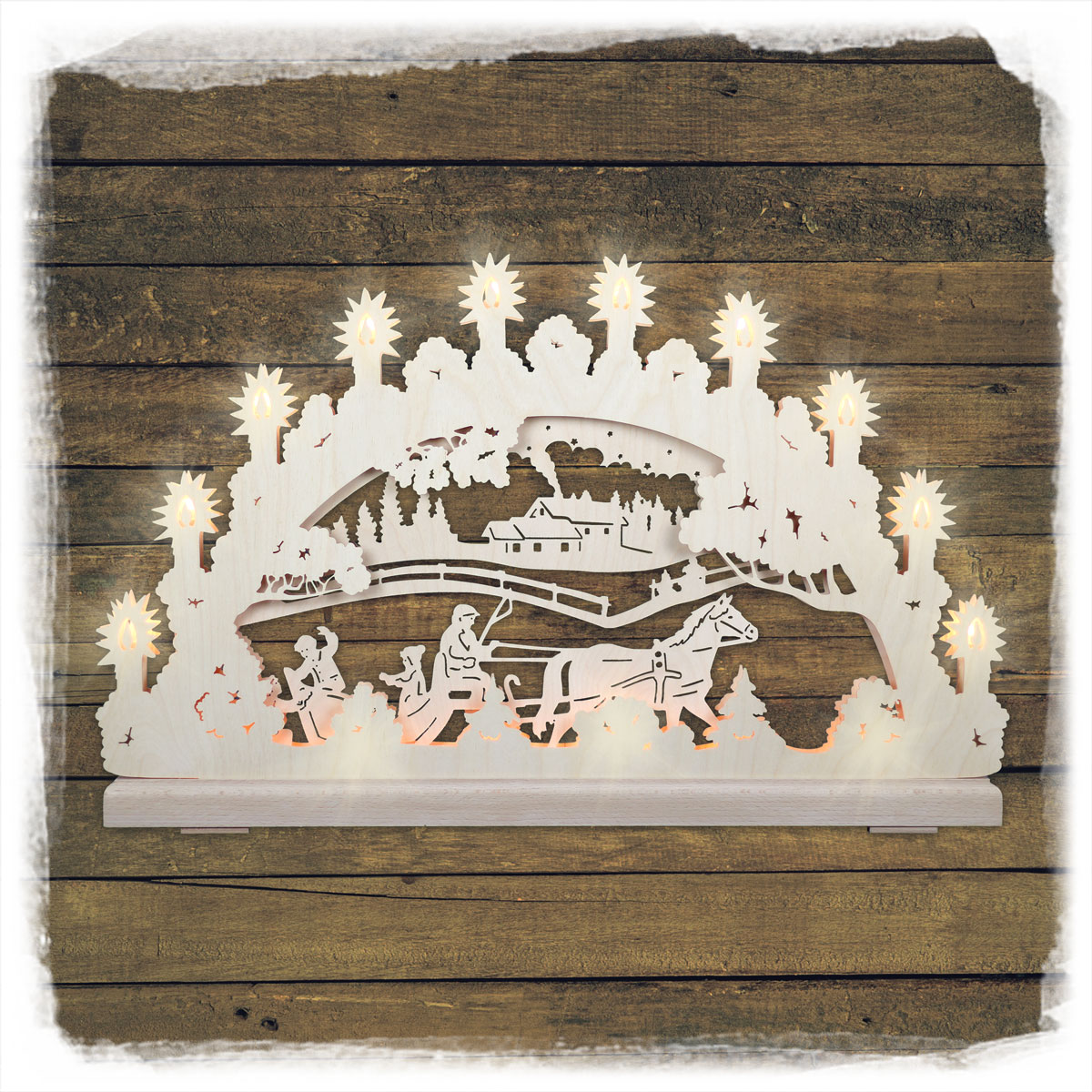 Erzgebirgs-Schwibbogen 'Schlittenfahrt' 3D 16 flammig (LED Optional) 66x6x44cm
